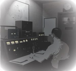 Dispatch sitting at the desk waiting for word from the constable.